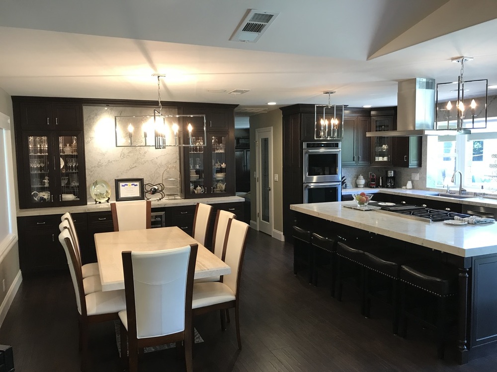 Outdated Home Gets A New Fresh Look With An Expanded And Modern Kitchen