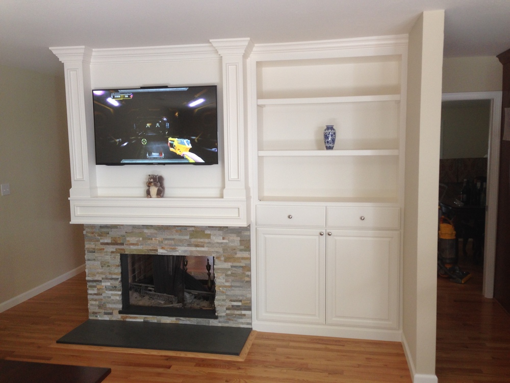 Outdated cabinets and brick walls given a fresh cabinet makeover