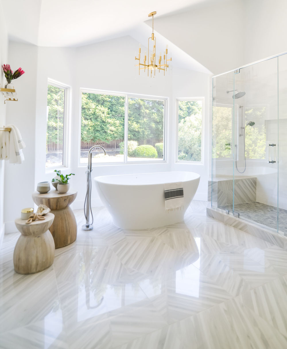 Master Bathroom gets a complete makeover with stunning tile work, custom cabinets, and a designer’s touch