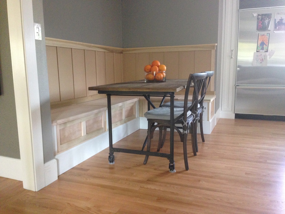 Custom kitchen bench seat with wall paneling and trunk storage
