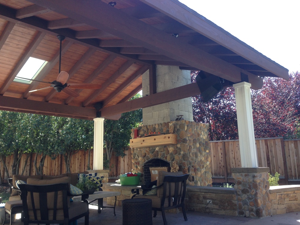 Outdoor Pavilion With Heavy Timber Beams And Custom Stone Work
