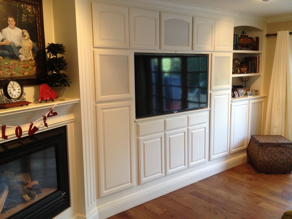 Existing Wall Unit Modified To Fit TV With Drawers And Doors Below